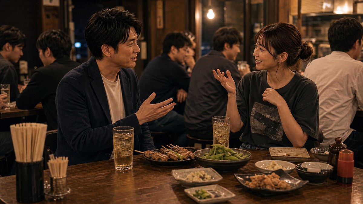 近くの飲み屋で打ち上げ気分。語り合ってるうちにいい雰囲気の要点を表す画像